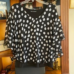 Adorable black and white polka dotted blouse